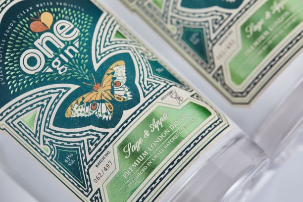 label detail from a bottle of one gin showing a printed butterfly